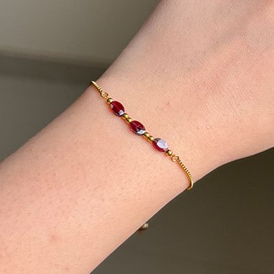 Trios Garnet Arm Wrap.